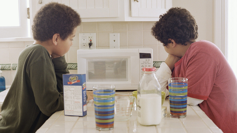 Kids waiting my microwave