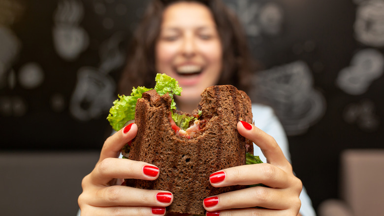 Sandwich with big bite in it