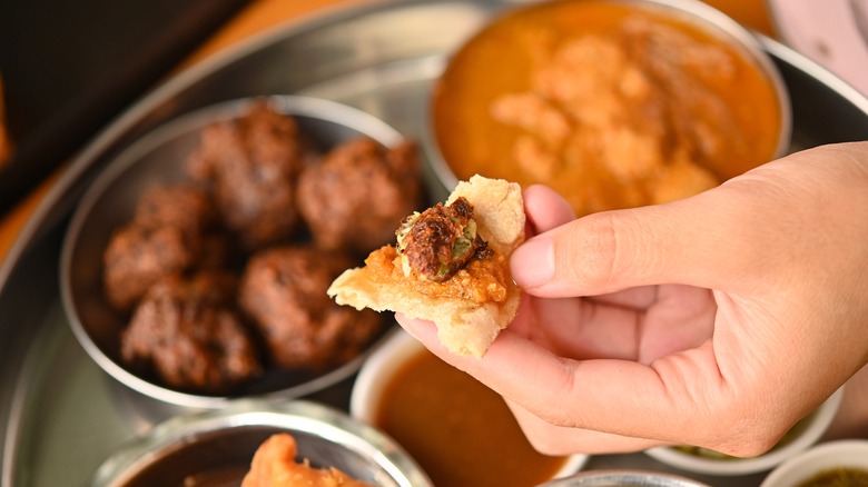 Eating Indian food by hand