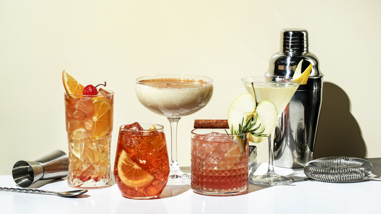 Assorted cocktails with shaker