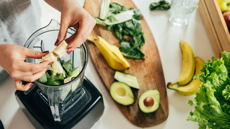 making smoothie with avocado
