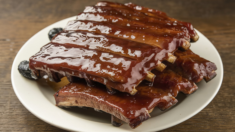 A plate of saucy barbecue ribs