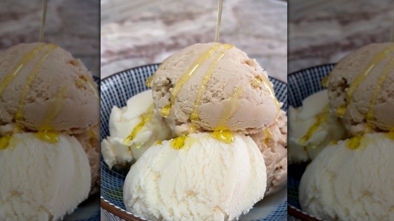 Olive oil being drizzled over ice cream