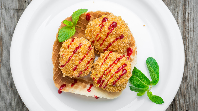 balls fried ice cream fruit sauce