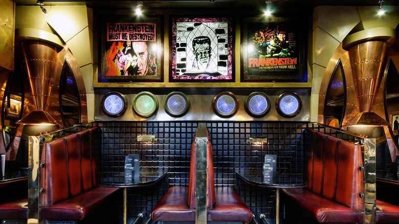 Red booths and plasma lights at Frankenstein pub