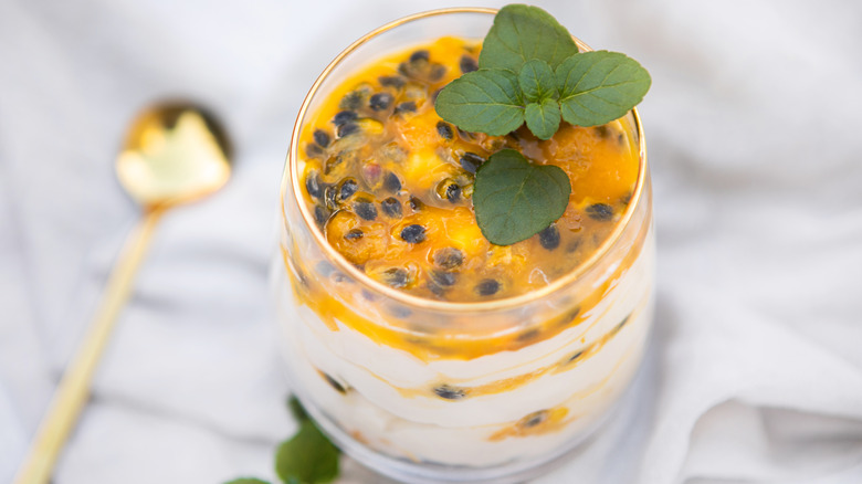 Passion fruit cream dessert in glass 