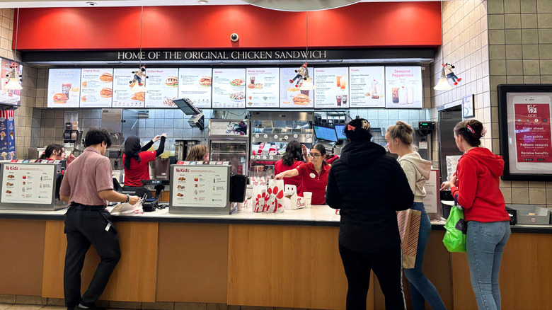 People ordering food from a Chick-fil-A restaurant