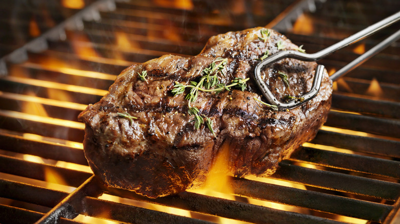 Cooking steak on a grill