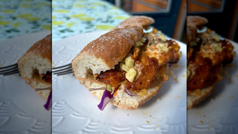 Fried catfish on a po'boy roll with slaw
