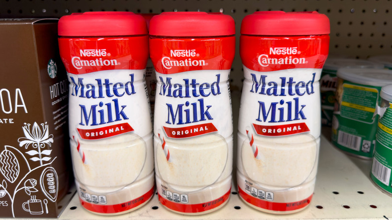 Containers of malted milk from Nestle Carnation