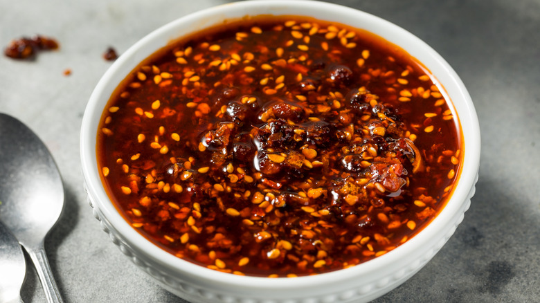 Assortment of jars of chili crisp and chili crunch Chinese condiments