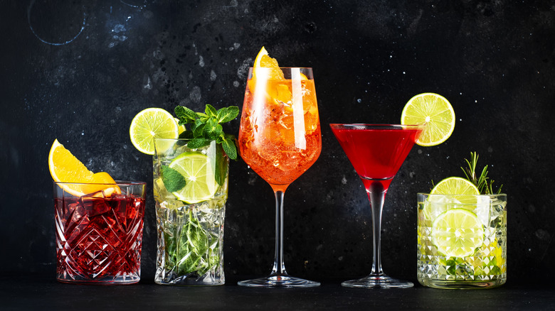 A variety of cocktails against a black background