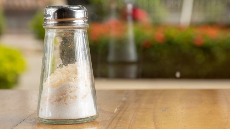 Salt shaker with grains of rice