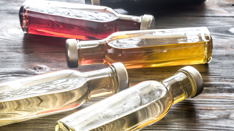 Bottles with different vinegars including white balsamic