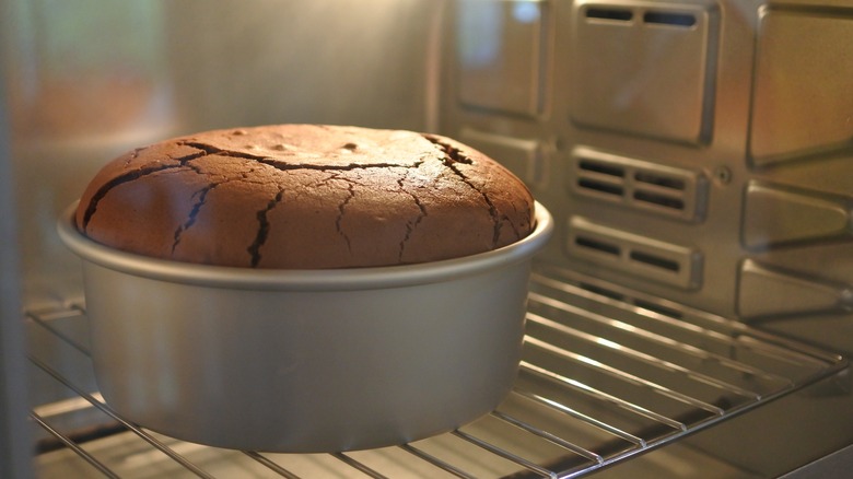 Chocolate cake baking in the oven