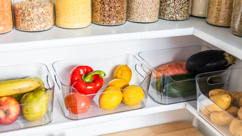 Pantry items organized in drawers and jars