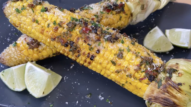 Grilled corn with herby garlic butter and chipotle chiles.