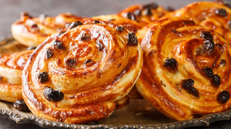 pain aux raisins on silver platter
