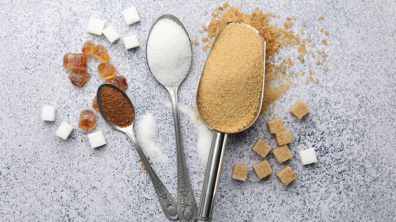 Different types of sugars in spoons