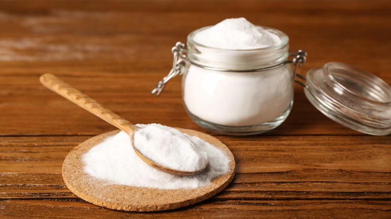 spoon and jar of baking powder