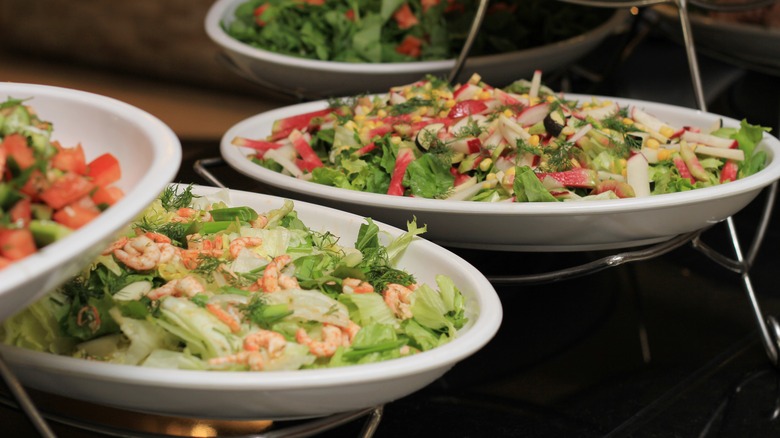 salads in bowls on a table