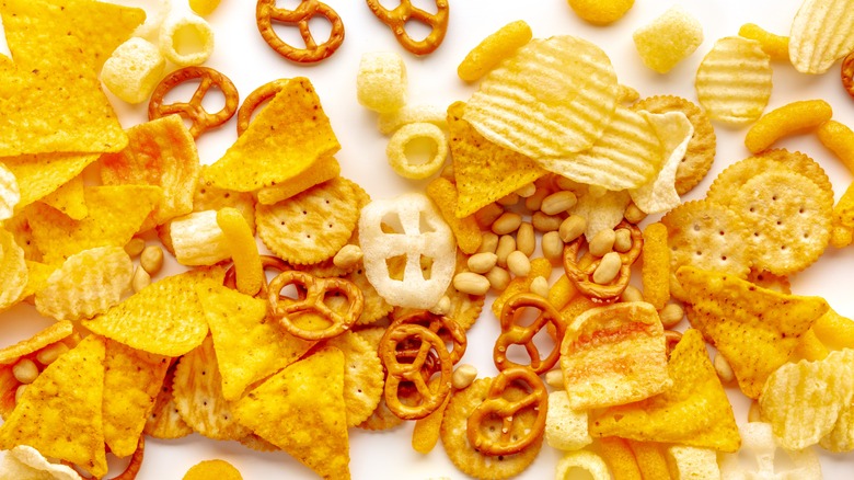 assorted snack food on white background