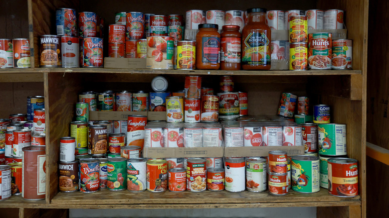 Pantry filled with canned food.
