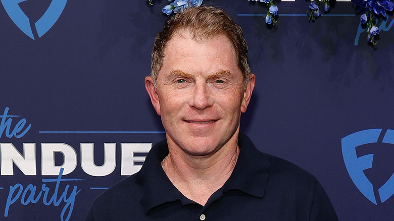 Bobby Flay smiling at 2024 Fanduel party event