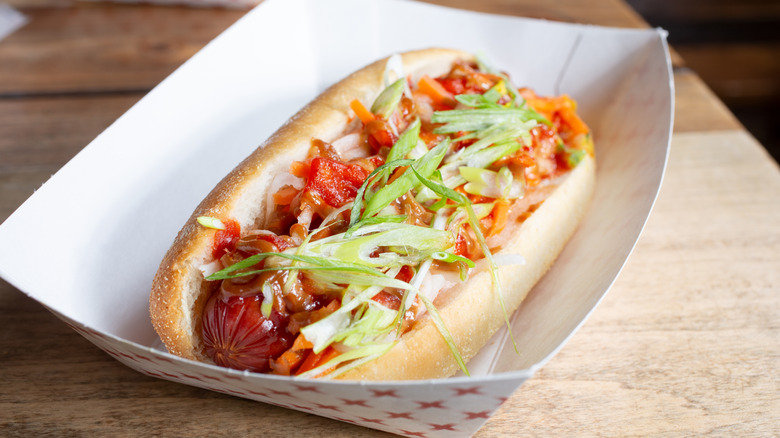 Hot dog with kimchi, scallions, and gochujang.