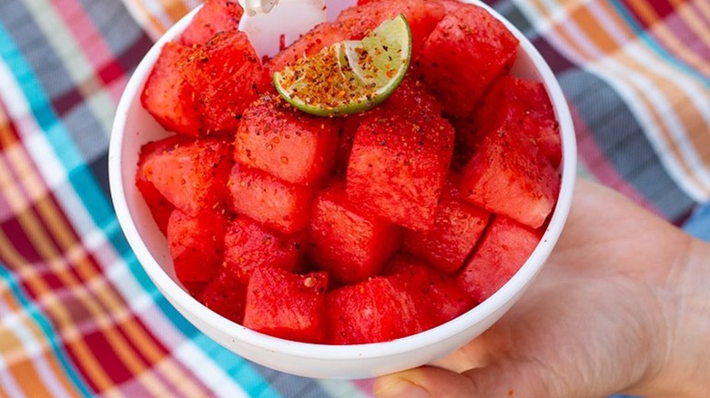 Tajín on watermelon chunks and lime slice