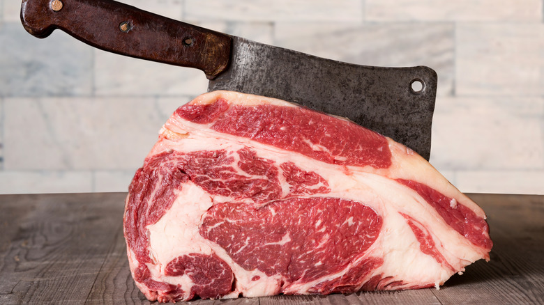 meat cleaver and ribeye steak