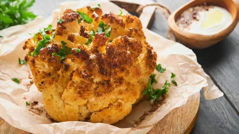roasted whole cauliflower on display