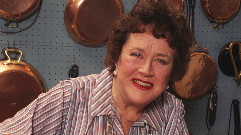 julia child smiling in her TV kitchen