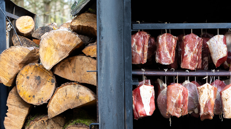 Pork in smoker getting cured