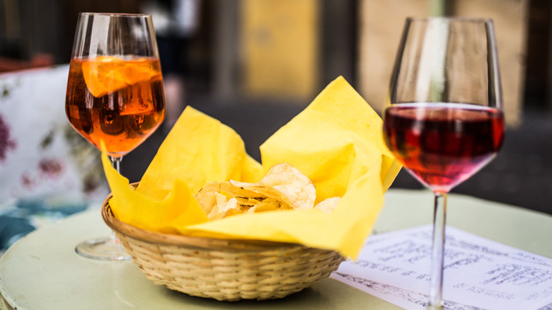 Wine glasses with potato chips