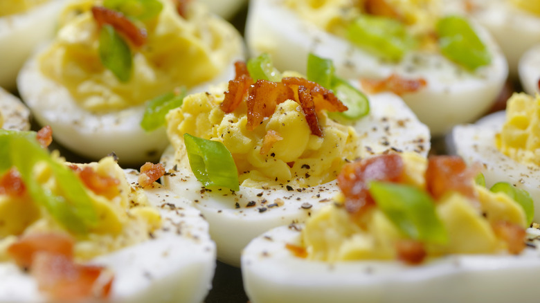 close up on deviled egg garnish