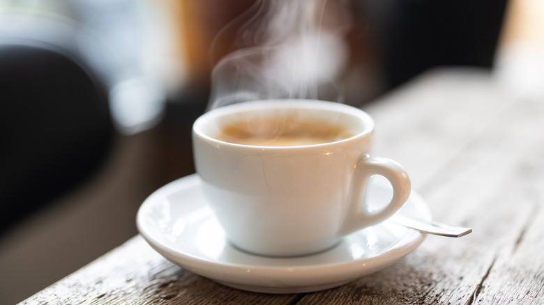 The Terrible Etiquette Mistake Everyone Makes With Hot Cafe Drinks