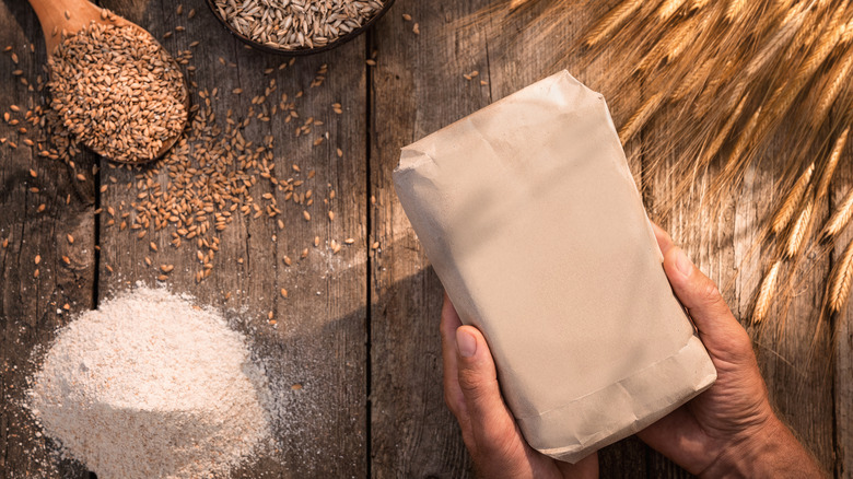Einkorn flour and berries with bag of flour