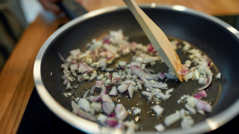 Onions frying in pan