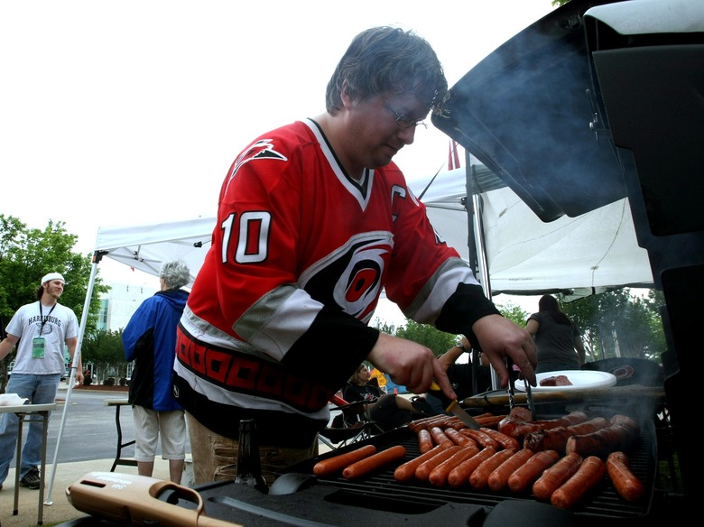 Parking lots near the Hurricanes' arena in Raleigh, NC open three hours before game time.