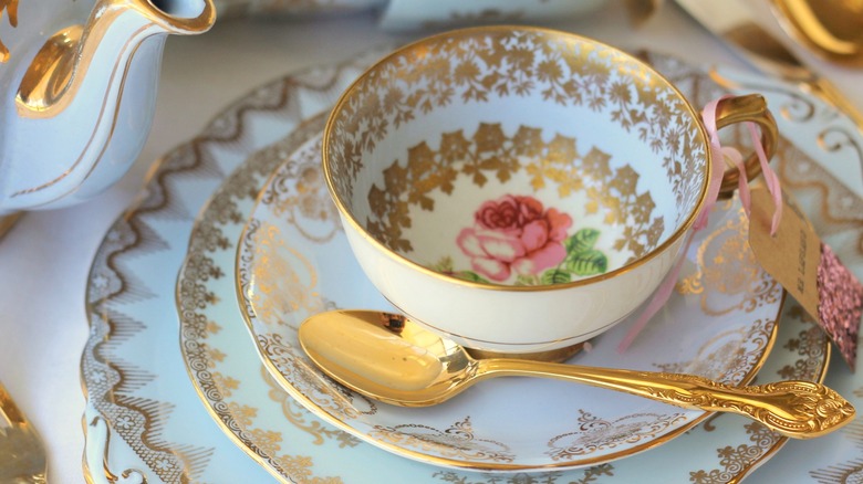 Vintage antique rose pattern table set of plates dishes teacup and gold spoon