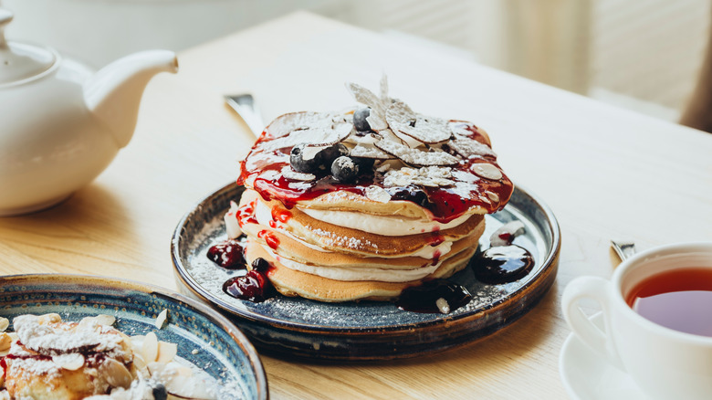 pancakes with berry preserves on top