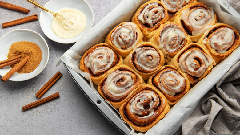 a tray of freshly baked cinnamon rolls