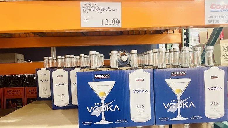 Costco shelf of Kirkland Signature American Vodka with price listed above
