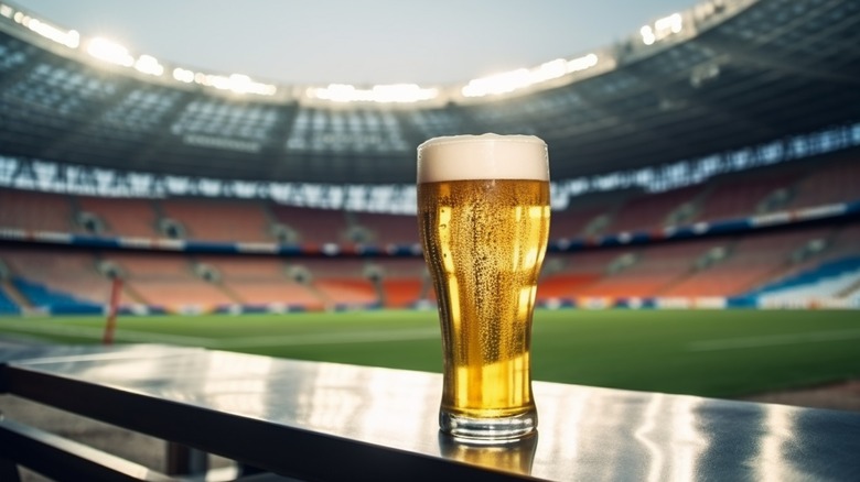 Beer in front of a football field