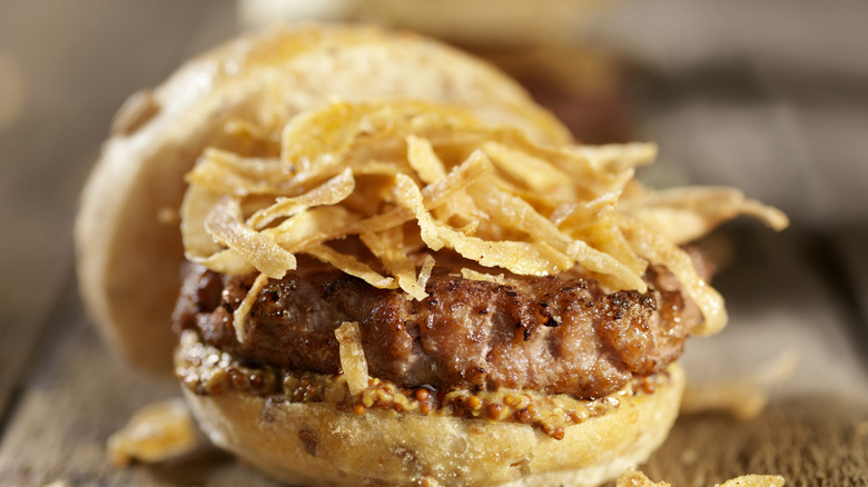 burger with crunchy onions on top
