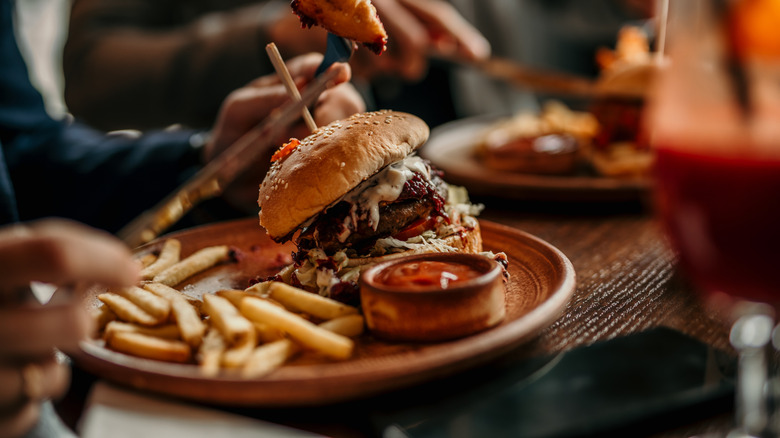 burger on a plate in a restaurant