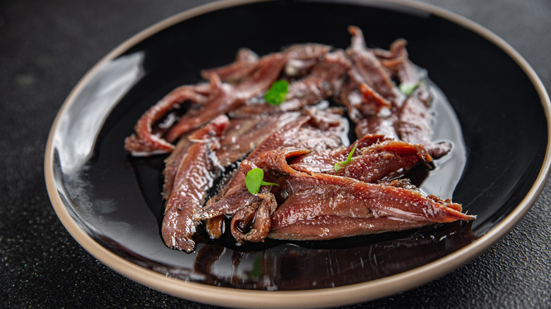 served plate of anchovy fillets