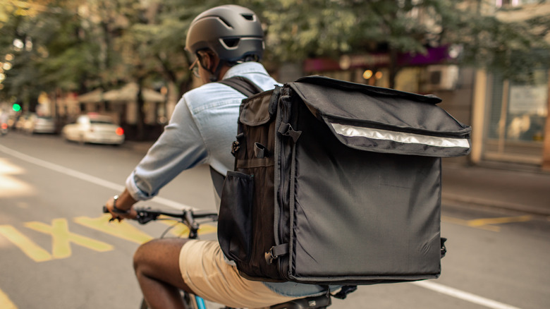 food delivery person on bike