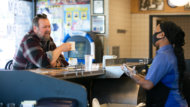 Customer and staff member at Waffle House